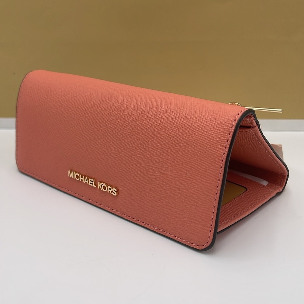 MICHAEL KORS JET SET TRAVEL LARGE TRIFOLD WALLET SHERBERT COLOR
NWT - Picture 14 of 16